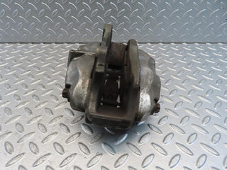 W221 front left brake caliper used OEM
