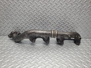 W126 Coupe exhaust manifold left used OEM