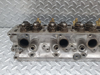 W126 Coupe cylinder head left side used OEM