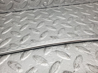 W123 rear left door window chrome frame used OEM