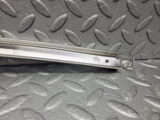 W123 rear right door chrome window channel used OEM