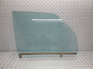 W123 Wagon front right window glass used OEM