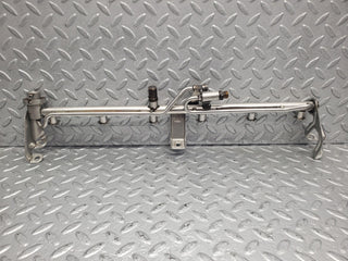 W124 Cabriolet fuel injector rail used OEM