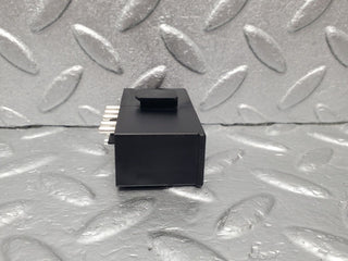 R129 SL seat locking relay left used OEM