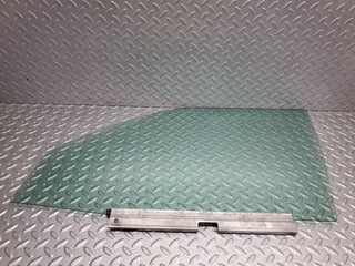 W124 Wagon front left door window glass used OEM