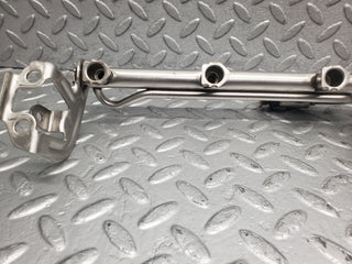 W124 Cabriolet fuel injector rail used OEM