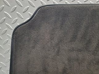 W201 Baby Benz front left floor carpet black used OEM