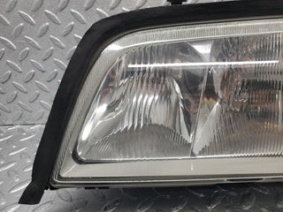 W202 headlight left side used OEM