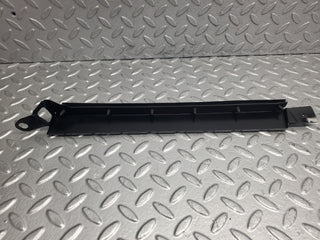 W124 Wagon under headlight trim right side used OEM