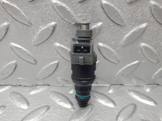W124 fuel injector used OEM
