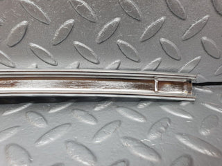 W108 rear left door window chrome channel used OEM