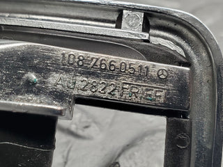 W123 chrome frame door opener left used OEM