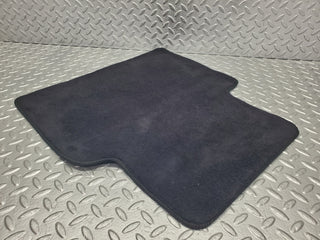 W201 Baby Benz rear left floor mat dark blue used OEM
