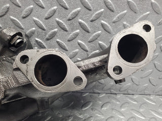 W201 Baby Benz exhaust manifold used OEM