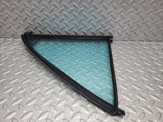 W210 rear left quarter window glass used OEM