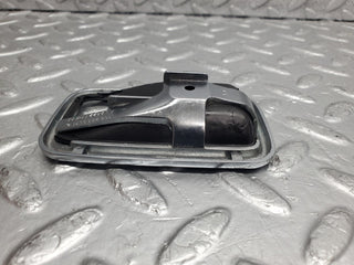 W123 chrome frame door opener left used OEM