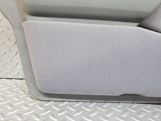 W124 front left door card grey used OEM