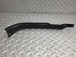 R107 SL headlight lower trim right side used OEM