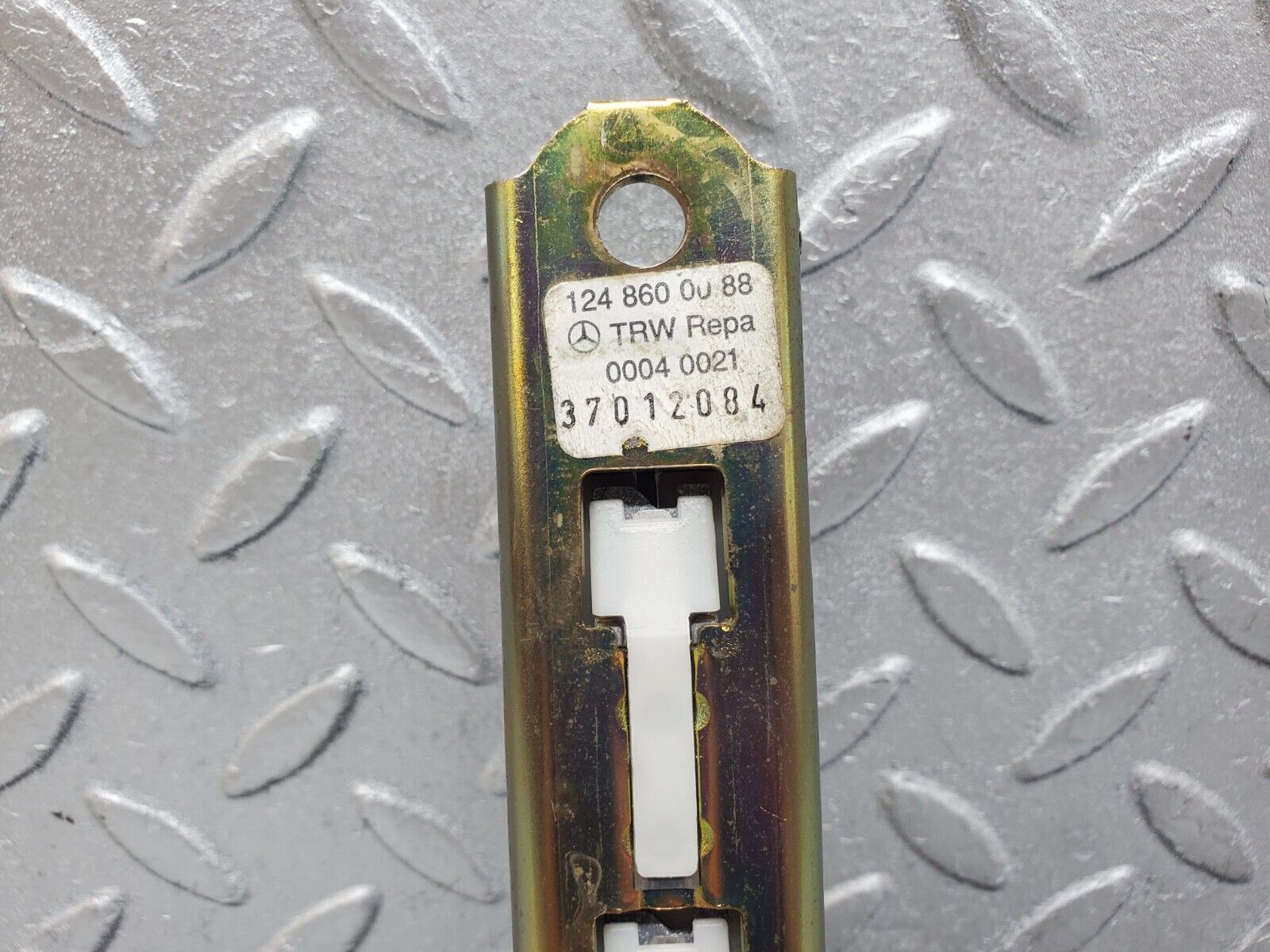 44798 Mercedes-Benz W124 220E Seat Belt Height Adjuster 1248600088