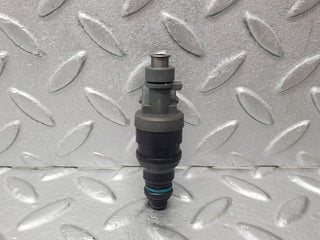 W124 fuel injector used OEM