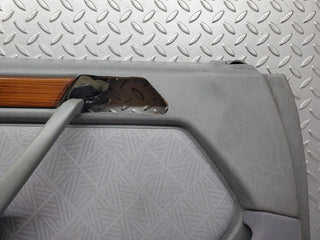 W124 front left door card grey used OEM