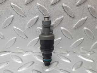 W124 fuel injector used OEM