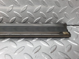 W124 front left door lower moulding trim used OEM
