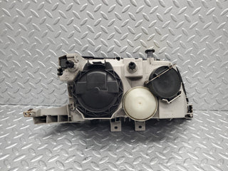 W202 headlight left side used OEM