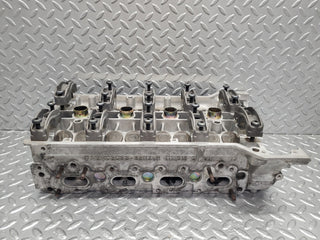 W124 Wagon cylinder head used OEM