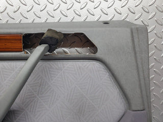 W124 rear left door card grey used OEM