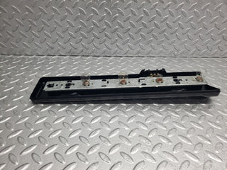 W123 tail light bulb holder left side used OEM