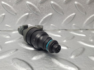 W124 fuel injector used OEM