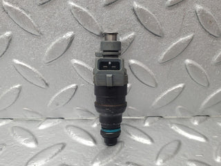 W124 fuel injector used OEM