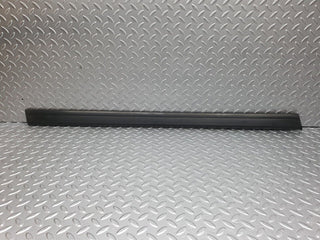W124 front left door lower moulding trim used OEM