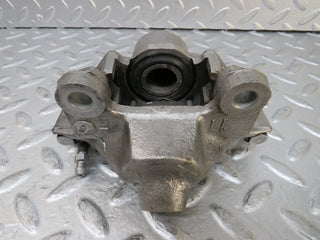 W124 Coupe rear left brake caliper used OEM
