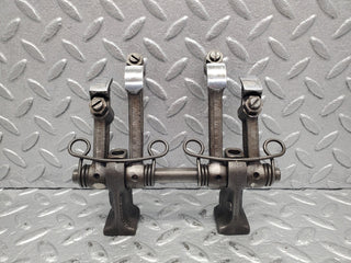 W112 rocker arm support with arm and shaft used OEM