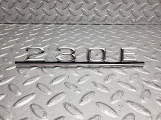 W123 trunk badge logo emblem used OEM