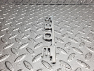 W123 trunk badge logo emblem used OEM