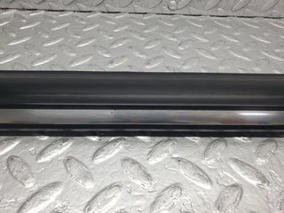 W123 front left door lower moulding trim used OEM
