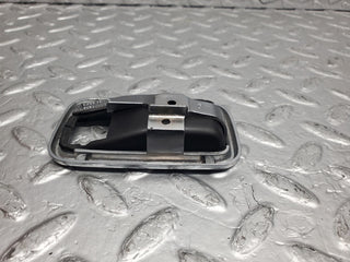 W123 chrome frame door opener right used OEM