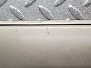 W124 rear left door lower moulding used OEM