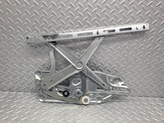 W140 front left power window regulator used OEM