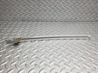 W123 rear left door chrome window channel used OEM