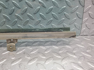W123 rear left door window glass used OEM