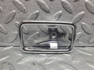 W123 chrome frame door opener right used OEM