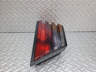W124 tail light left side used OEM