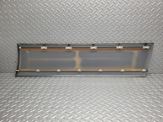 W124 Wagon front left door lower trim used OEM