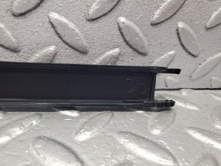 W201 Baby Benz under headlight trim right used OEM