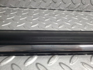 W123 front left door lower moulding trim used OEM
