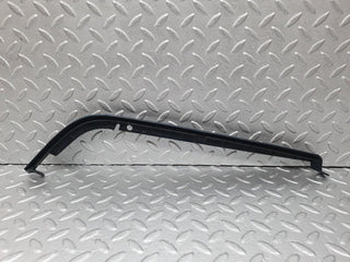 W202 under headlight trim right used OEM